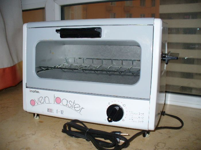 9.5成新电烤箱-100元.JPG